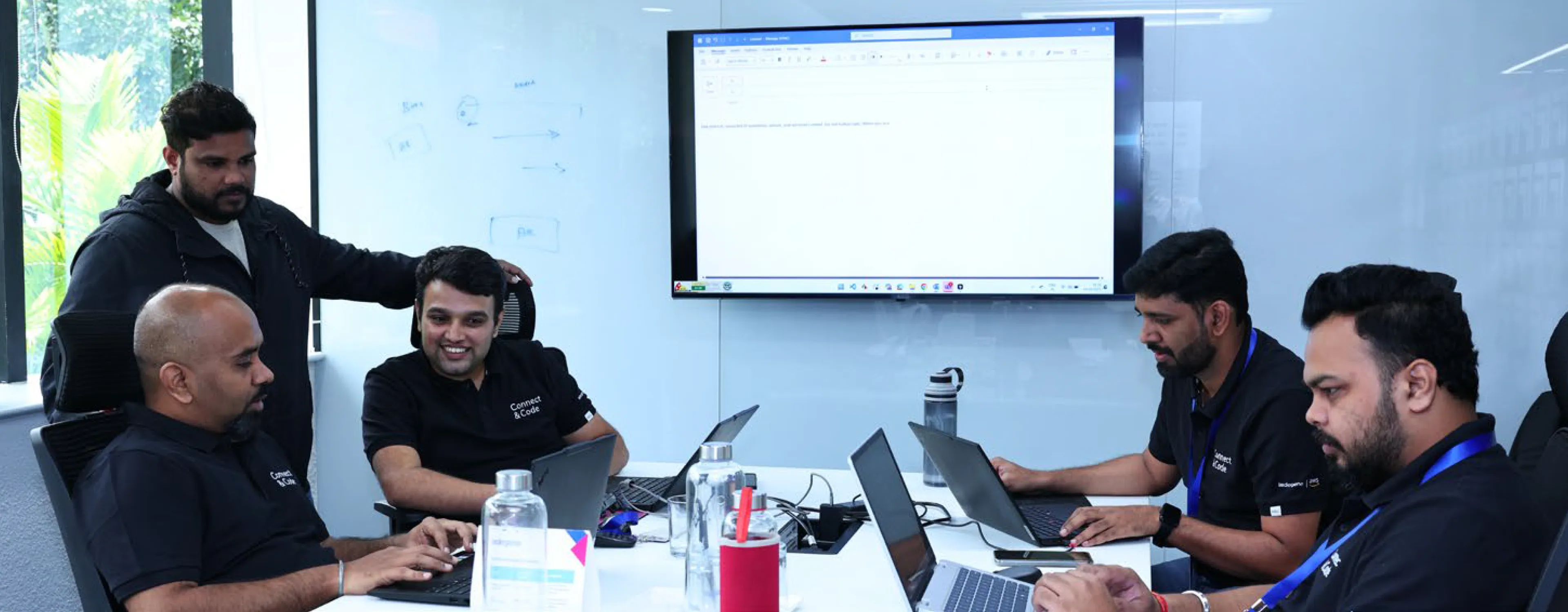 Indegene team collaborating